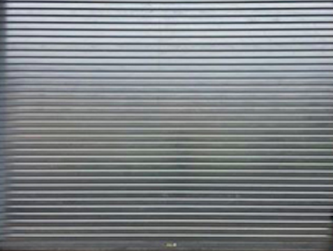 Rideau métallique à lame pleine Rideau métallique à lame pleine